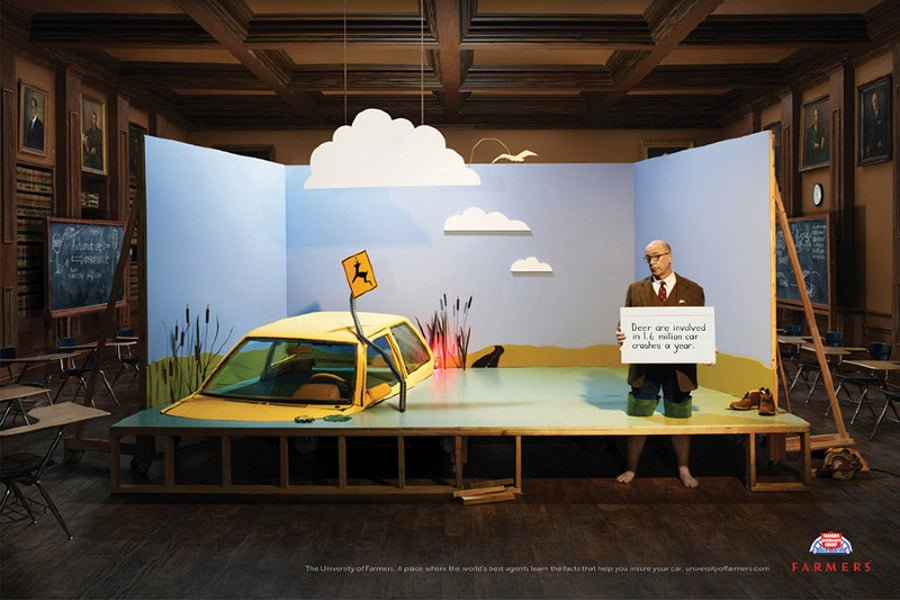 man and sinking car on a stage set