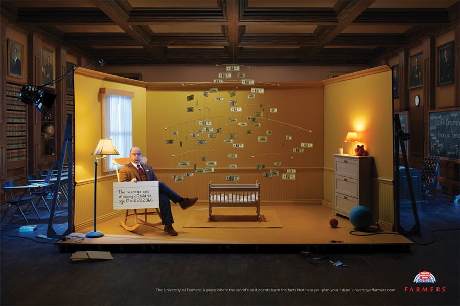 man on a stage sitting in a nursery