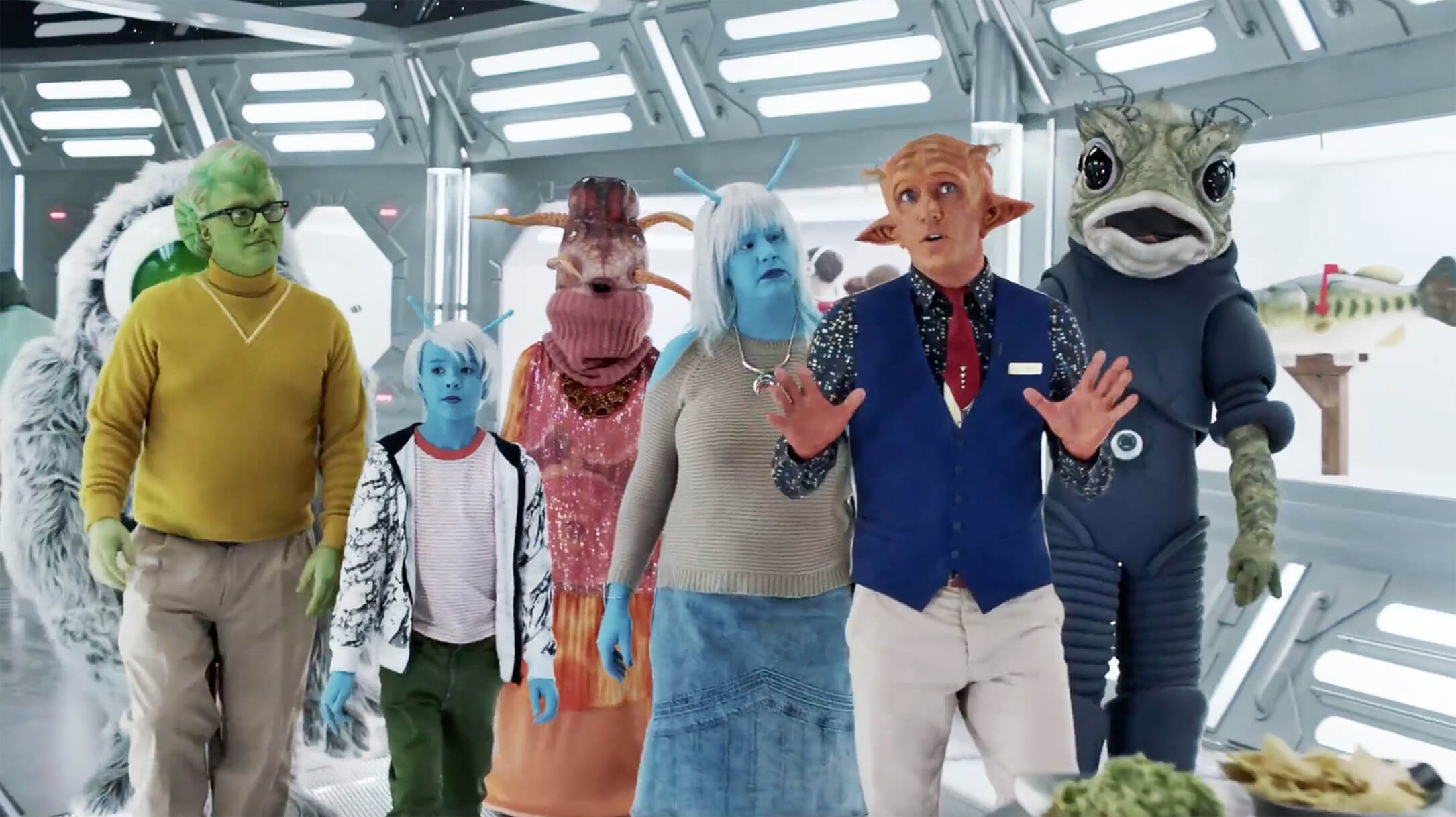 Alien tour guide with a group of alien tourists behind him